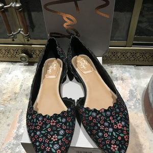 Black floral flats